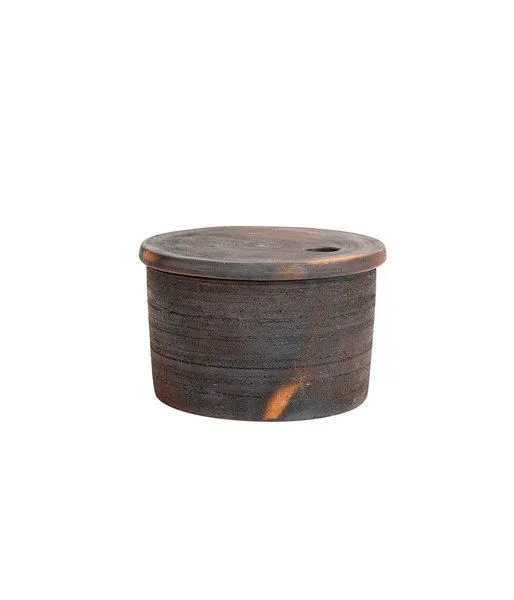 Hazel Serving Bowl in dark textured ceramic with subtle orange accents and a fitted lid with a knob hole