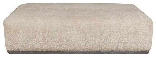 Rectangular upholstered ottoman in light beige with soft textured fabric and clean modern lines