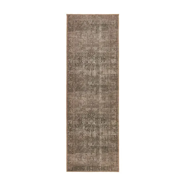 Long narrow natural jute area rug in neutral brown tones with distressed vintage floral pattern
