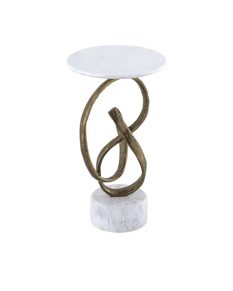 Ruban Accent Table with white marble round top and base, featuring a looping antique brass cast aluminum ribbon base