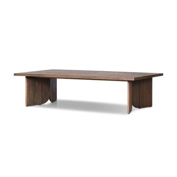 Joette Outdoor Coffee Table with simple angular base and stained saddle brown FSC-certified teak wood
