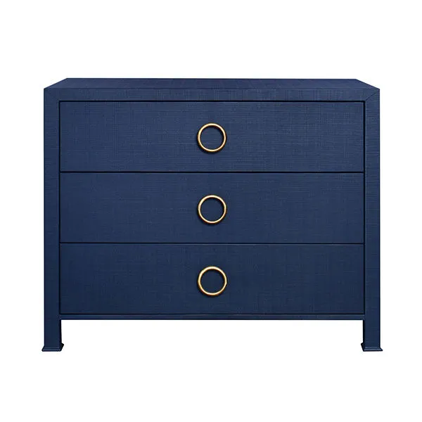 Three-drawer chest in deep navy blue with brass ring pulls and textured finish, modern and timeless design