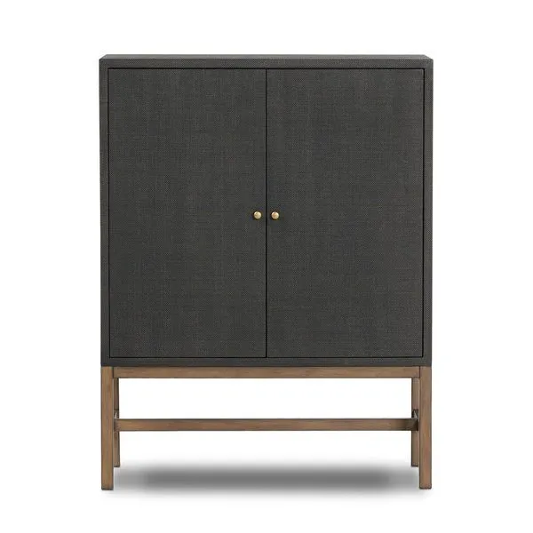 Fiona Bar Cabinet with black woven raffia front, antique brass hardware, and solid mahogany open base