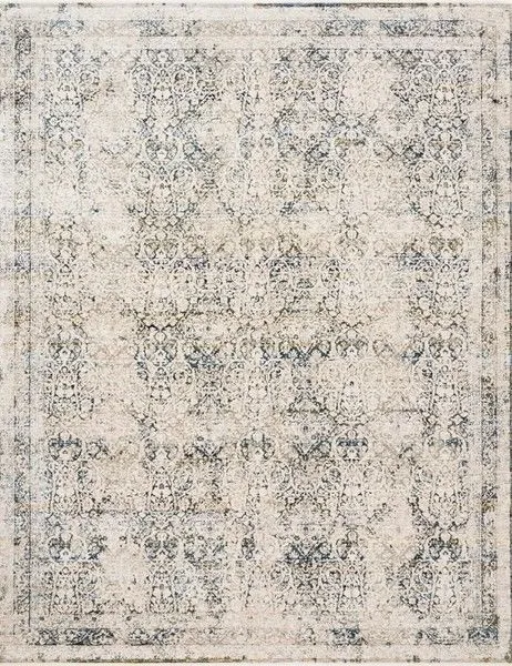 Theia Natural Ocean Rug with muted beige, blue, and cream color palette featuring intricate patterned design and subtle pi...