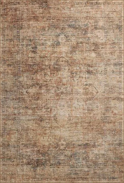 Traditional Anniston Clay Charcoal rug with distressed, saturated earth tones and faded motifs