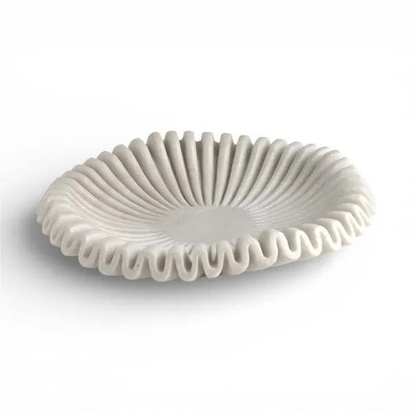 White marble bowl with smooth finish and soft ruffled edges, shallow and round with sculptural charm