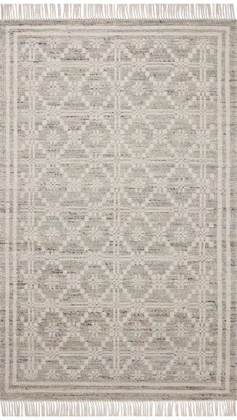 Ivory Rivers Lagoon rug with symmetrical motifs in soft natural tones and fringe on both ends