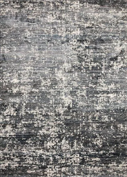 Augustus Denim Rug with abstract pattern in shades of blue, gray, and beige, flat woven texture