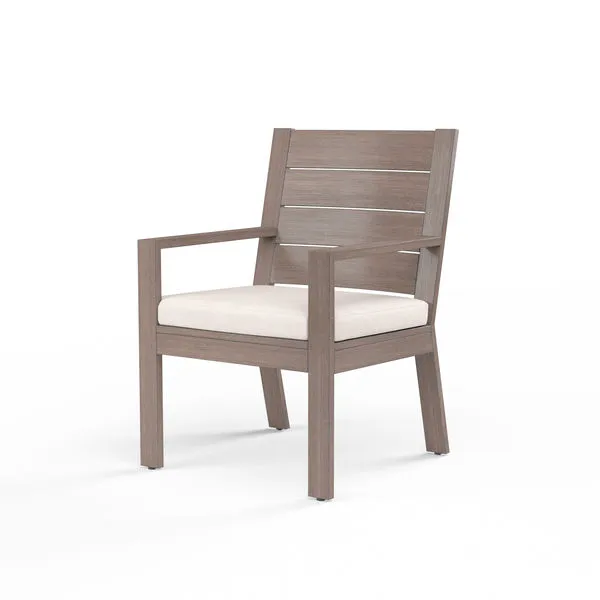 Laguna Dining Chair in hand-brushed aluminum with driftwood finish and beige seat cushion