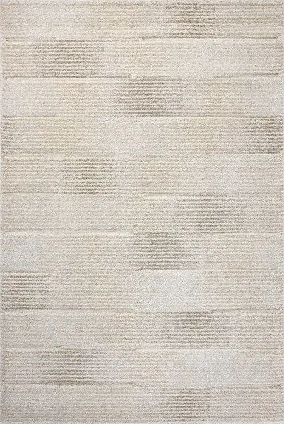 Natural-colored rug with subtle geometric patterns in varying tonal stripes and soft fading