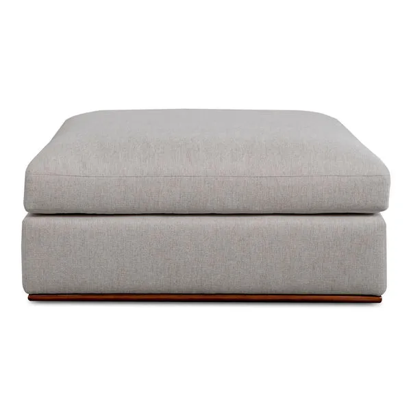 Rue Ottoman front view emphasizing thick cushion layered over wooden base