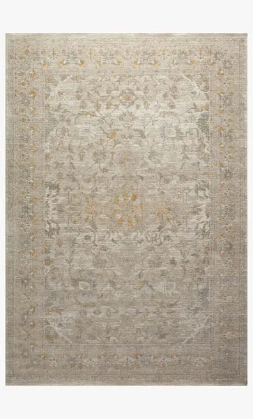 Ivory and natural traditional rug with subtle floral medallion pattern and muted warm beige accents