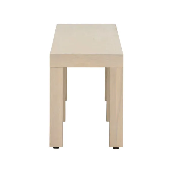 Long Parsons-style coffee table in light oak veneer with clean lines and minimalist design, viewed from side edge