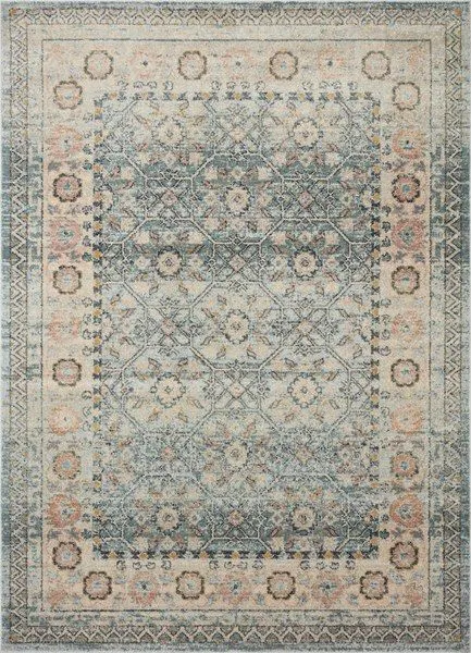 Vintage style rectangular rug with antique-inspired floral and geometric motifs in muted blue, peach, and cream tones