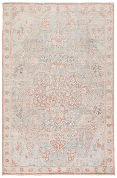 Fay Medallion area rug with softly faded orange and light blue floral medallion design on a neutral background