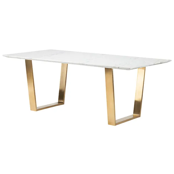 Catrine Dining Table with white marble rectangular top and brushed gold stainless steel legs in trapezoid shape
