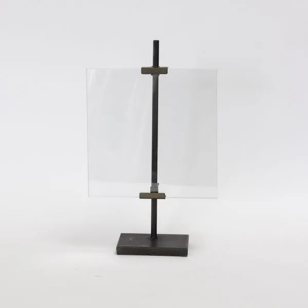 Kiran Gunmetal Picture Frame with a sleek gunmetal vertical stand and clear glass pane on a rectangular base