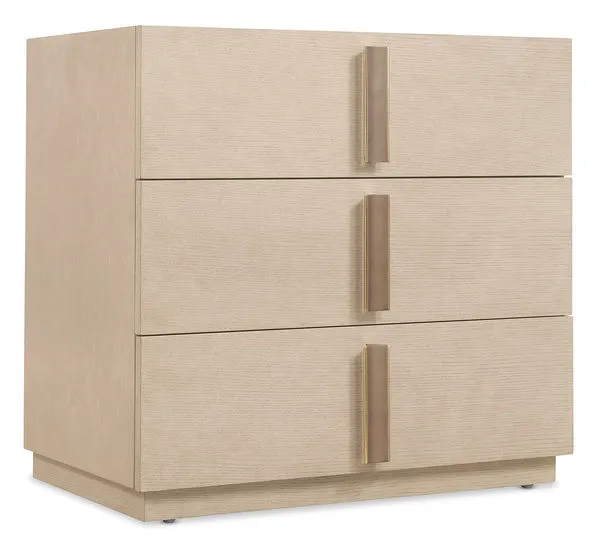 Westwood nightstand with three spacious drawers in polished limestone oak veneer and radiant plated bar handles