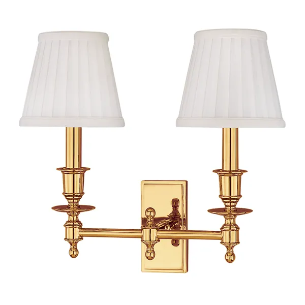 Ludlow 2 Light Wall Sconce with pleated white shades and polished brass finish on stepped backplate