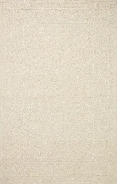 Ivory rug with tone-on-tone traditional motif pattern in a hand-tufted wool pile