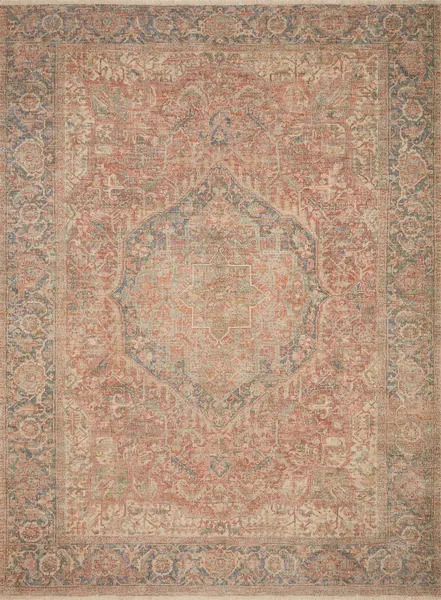 Full top-down view of Priya Brick Navy rug displaying overall medallion and border design in muted brick and navy tones