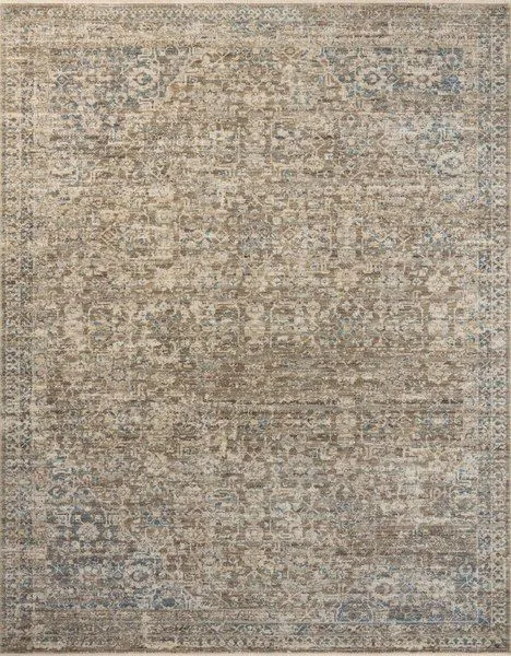 Earth-toned traditional area rug featuring intricate vintage-inspired floral and geometric motifs with cream and blue accents
