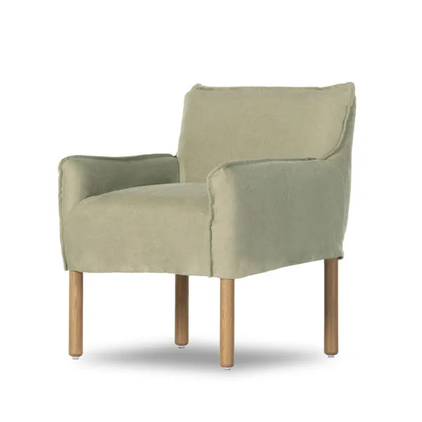 Khaki slipcover dining armchair with solid oak legs, soft Belgian linen upholstery, and relaxed arm design