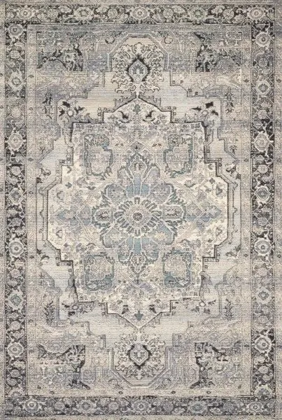 Rectangular Mika Grey / Blue Rug with an abstract tribal-inspired medallion pattern and textured yarn in muted tones
