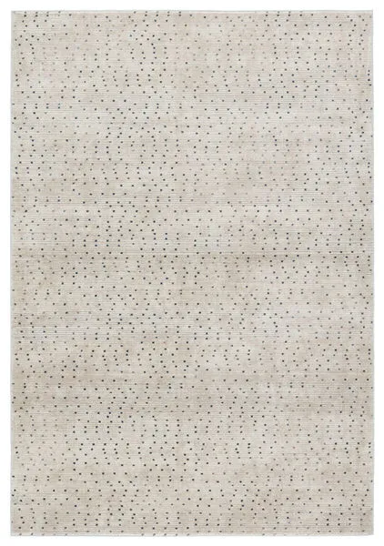 Beige area rug with gray and brown dot pattern in a subtle abstract design, soft high-low texture