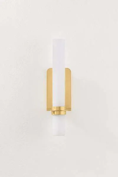 Front view of Groveland Station Wall Sconce showing symmetrical brass backplate and glass tube
