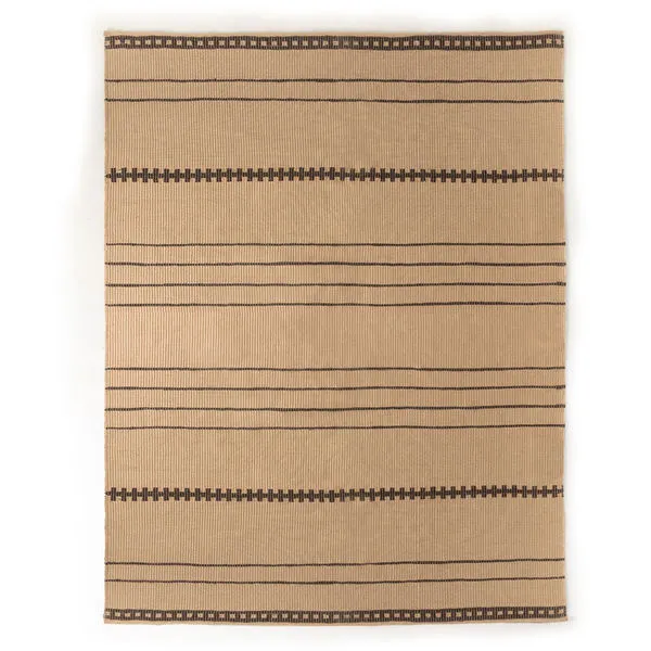 8x10 foot Vallarta Brown outdoor rug in faux jute with Moroccan Tuareg inspired bold brown symbols and patterns