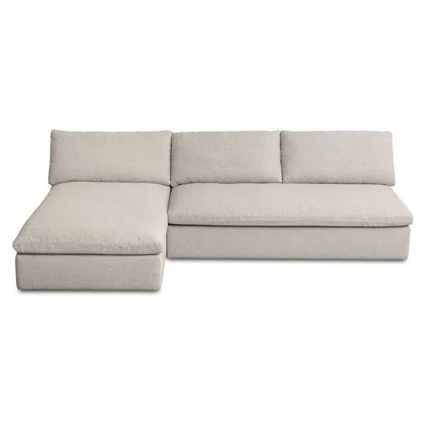 Beige two-piece outdoor sectional with aluminum frame and plush seat and back cushions