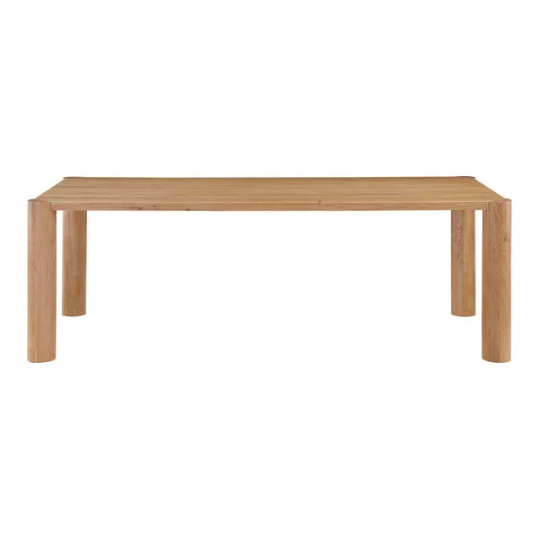 Post dining table in solid white oak with rounded posts at each corner and natural wood grain finish