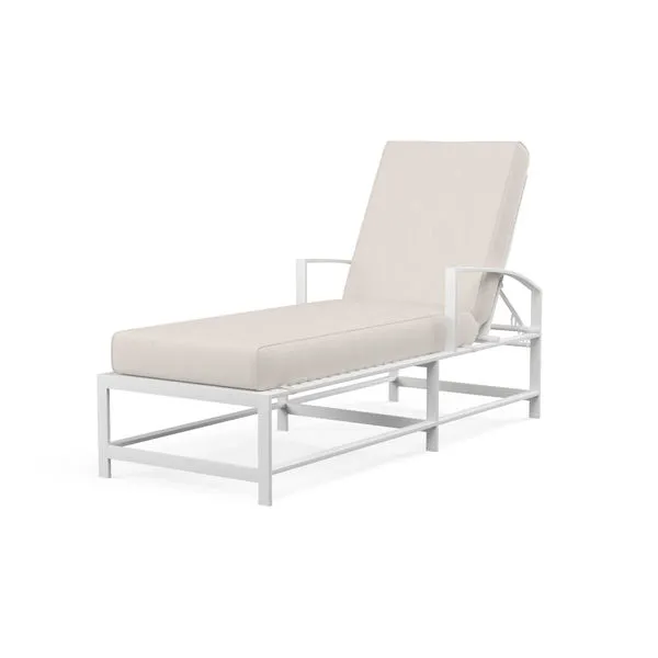 White aluminum Bristol Chaise with gently curved X back and seat, straight channel legs, and subtly curved arms
