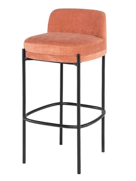 Three-quarter view showing rounded seat edges and curved backrest on black metal legs
