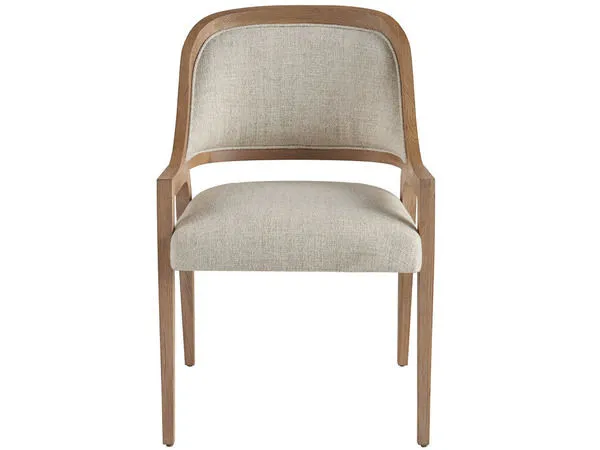 Avaline Arm Chair with slender wood legs and gently curved back upholstered in light beige fabric
