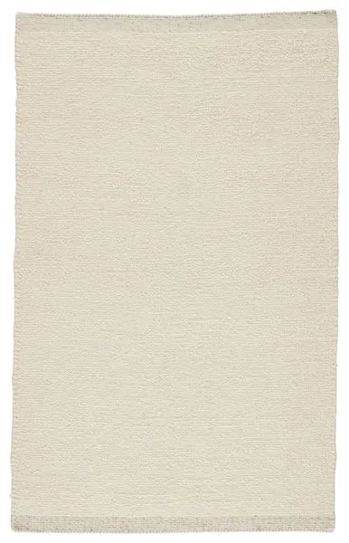 Hand-loomed solid cream rug with soft shearling texture and flatwoven light gray and ivory heathered edges