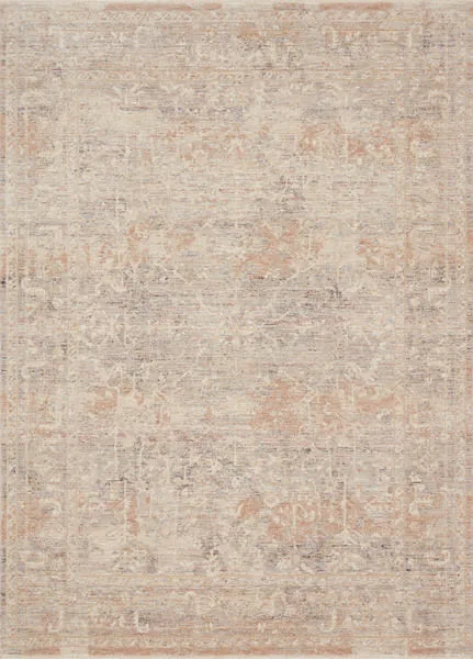Faye rug laid flat showing full traditional-inspired medallion and border pattern in soft beige and blue.