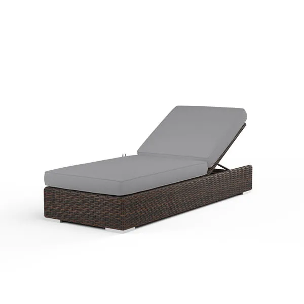Montecito Adjustable Chaise in cognac multi-colored resin wicker with gray cushioned seating and adjustable backrest