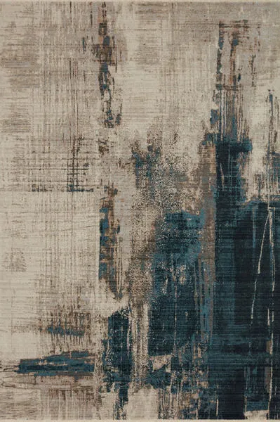 Leigh Slate Denim Rug with abstract distressed pattern in shades of beige, brown, and dark blue, modern and traditional blend