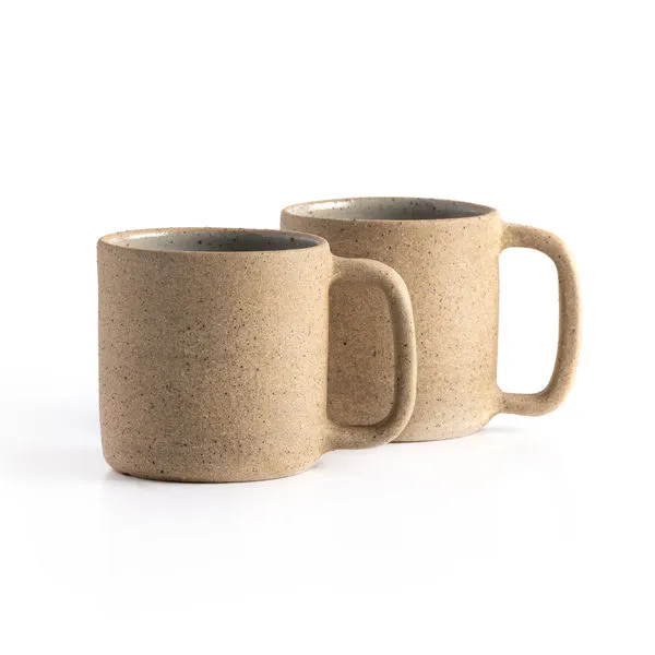 Set of two natural speckled clay coffee mugs with round shape and wide handles