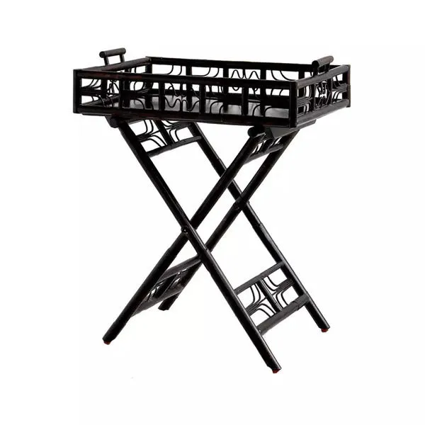 Black lacquered Indochine Butler Tray with openwork side panels and crossed folding legs
