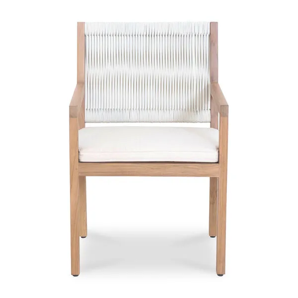 Luce outdoor dining chair with white synthetic wicker backrest, teak frame, and removable ivory cushion