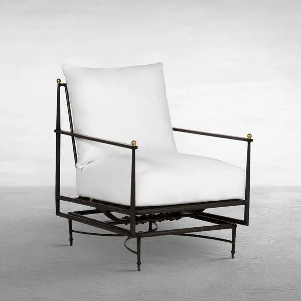 Roma Aluminum Outdoor Spring Lounge Chair with dark metal frame, white cushions, and brass finials on armrests