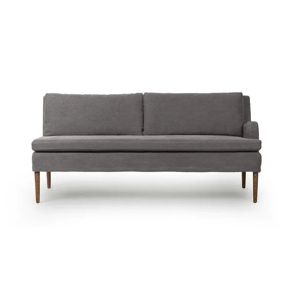 Aurelia Dining Banquette in Broadway Denim fabric with solid oak legs in amber oak finish, featuring clean modern silhouette