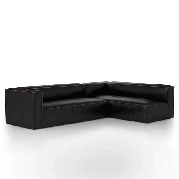Left arm facing 2-piece sectional in black top-grain leather with contrast stitching and sleek cushioning