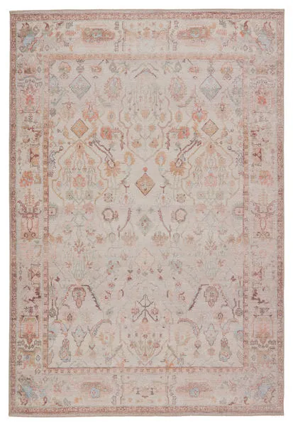 Low-pile traditional rug in blush cream with ornate Old World-inspired floral and geometric motifs