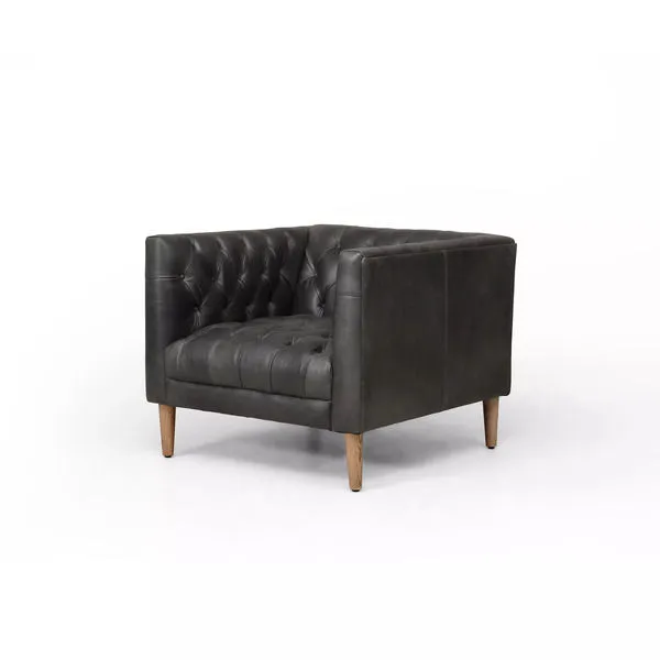 Ebony leather Williams chair with tufted seat and back, square arms, and wooden tapered legs
