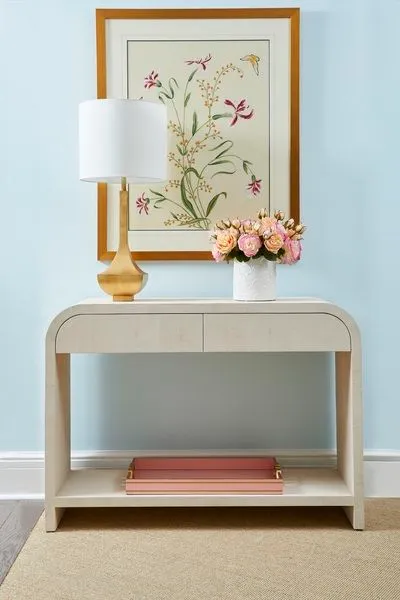 Watercolor painting titled Garden Surprise with botanical flowers, hummingbird in antique gold frame with glass
