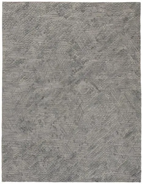 Textured gray and green modern area rug with a softly-defined geometric high-low pattern in 2 by 3 feet size